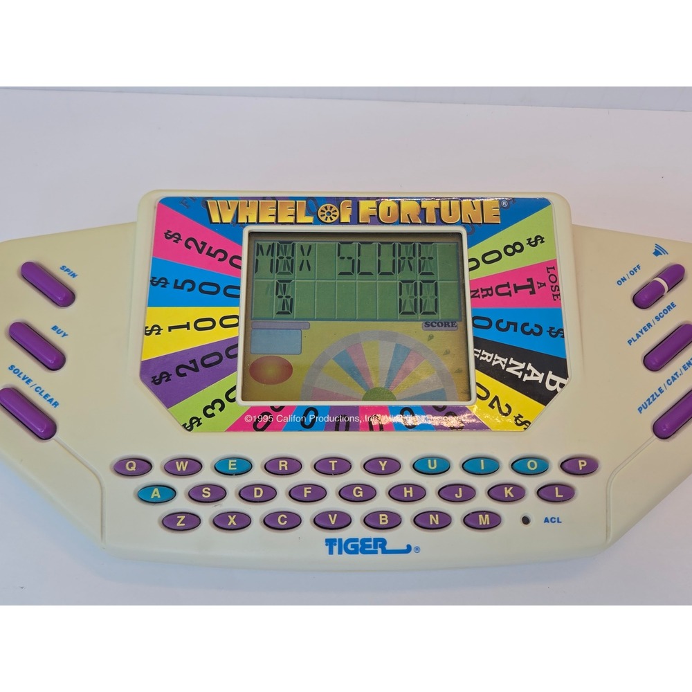 Vintage 1995 Tiger Electronics Wheel of Fortune Handheld Game with Cartridge 9